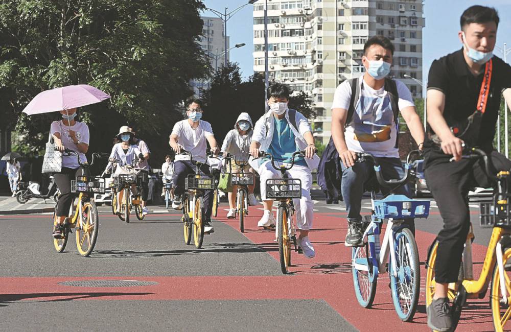 Se promener &agrave; v&eacute;lo &agrave; P&eacute;kin